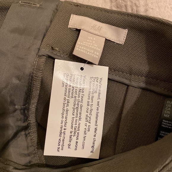 H&M green mini skirt. Size 4 . New. - Picture 6 of 12